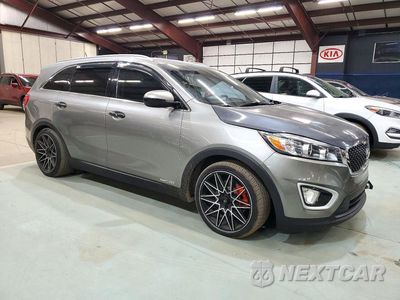 Czwarte zdjęcie samochodu z boku: 2016 KIA SORENTO LX V6 VIN:5XYPGDA56GG173151 - miniatura