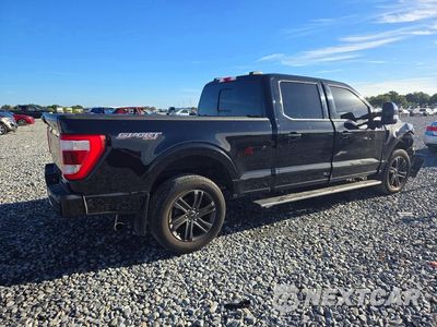 Trzecie zdjęcie samochodu z tyłu: 2022 FORD F150 LARIAT VIN:1FTFW1E82NFA32787 - miniatura