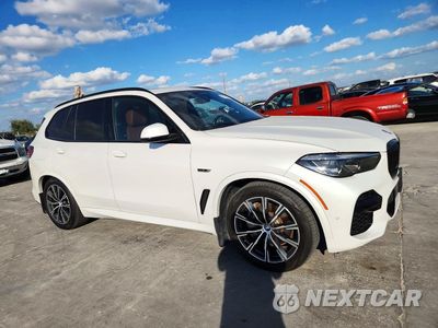 Czwarte zdjęcie samochodu z boku: 2022 BMW X5 XDRIVE45E VIN:5UXTA6C0XN9M84589 - miniatura