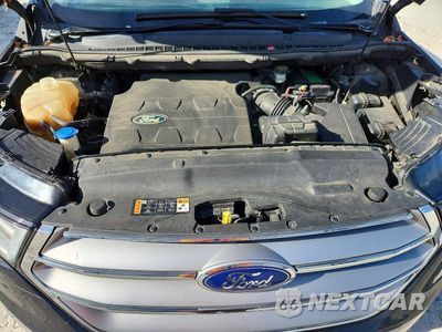 Zdjęcie 12 z 13 samochodu: 2015 FORD EDGE SEL VIN:2FMTK4J81FBB48616 - miniatura
