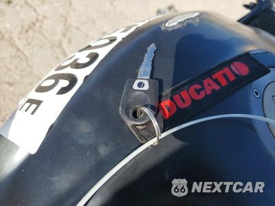 Zdjęcie 8 z 9 samochodu: 2006 DUCATI MONSTER 620 VIN:ZDM1RA2K36B077333 - miniatura