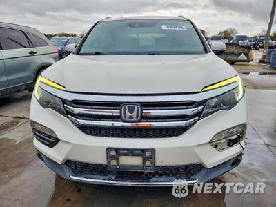 Piąte zdjęcie samochodu w środku: 2016 HONDA PILOT TOURING VIN:5FNYF5H9XGB021760 - miniatura
