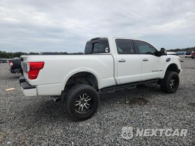 Trzecie zdjęcie samochodu z tyłu: 2016 NISSAN TITAN XD PLATINUM RESERVE VIN:1N6BA1F44GN516149 - miniatura