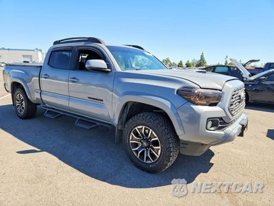 Czwarte zdjęcie samochodu z boku: 2021 TOYOTA TACOMA TRD SPORT VIN:3TMBZ5DN4MM031403 - miniatura