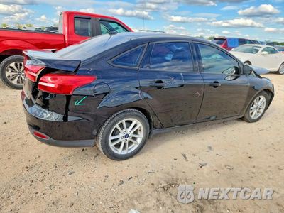 Trzecie zdjęcie samochodu z tyłu: 2016 FORD FOCUS SE VIN:1FADP3F22GL305652 - miniatura