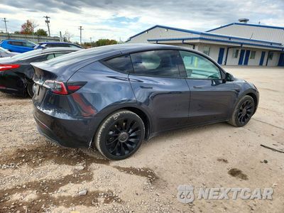 Trzecie zdjęcie samochodu z tyłu: 2022 TESLA MODEL Y VIN:7SAYGAEE3NF519466 - miniatura