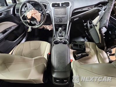 Zdjęcie 8 z 12 samochodu: 2015 FORD FUSION TITANIUM PHEV VIN:3FA6P0SU0FR201109 - miniatura