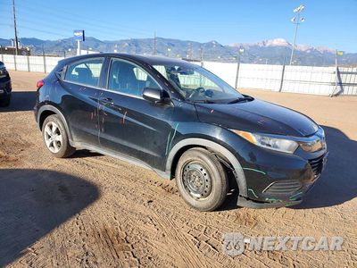 Czwarte zdjęcie samochodu z boku: 2019 HONDA HR-V LX VIN:3CZRU6H39KG711749 - miniatura