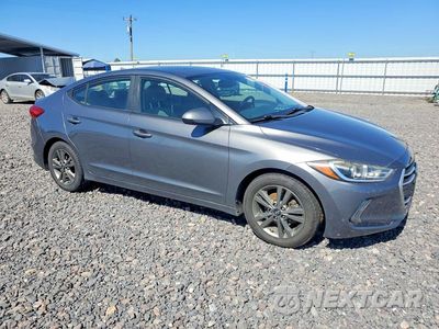Czwarte zdjęcie samochodu z boku: 2018 HYUNDAI ELANTRA VALUE EDITION VIN:5NPD84LF3JH239452 - miniatura