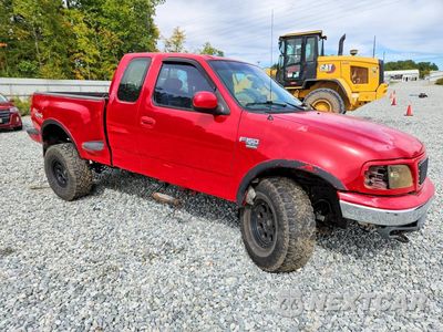 Czwarte zdjęcie samochodu z boku: 2002 FORD F150 VIN:2FTRX08W92CA47826 - miniatura