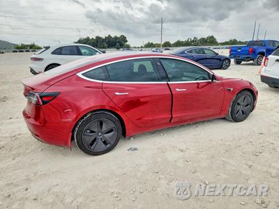 Trzecie zdjęcie samochodu z tyłu: 2018 TESLA MODEL 3 VIN:5YJ3E1EA3JF039755 - miniatura