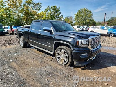 Czwarte zdjęcie samochodu z boku: 2017 GMC SIERRA K1500 DENALI VIN:3GTU2PEJ6HG400156 - miniatura