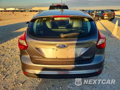 Zdjęcie 6 z 12 samochodu: 2014 FORD FOCUS TITANIUM VIN:1FADP3N22EL381001 - miniatura