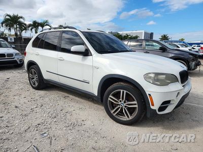 Czwarte zdjęcie samochodu z boku: 2012 BMW X5 XDRIVE50I VIN:5UXZV8C51CL423296 - miniatura