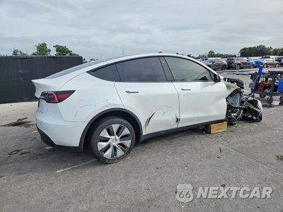 Trzecie zdjęcie samochodu z tyłu: 2023 TESLA MODEL Y VIN:7SAYGDEEXPF672883 - miniatura