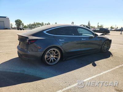 Trzecie zdjęcie samochodu z tyłu: 2018 TESLA MODEL 3 VIN:5YJ3E1EA9JF018909 - miniatura