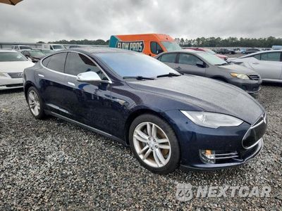 Czwarte zdjęcie samochodu z boku: 2014 TESLA MODEL S VIN:5YJSA1H18EFP42986 - miniatura