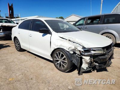 Czwarte zdjęcie samochodu z boku: 2016 VOLKSWAGEN JETTA SE VIN:3VWD67AJXGM297007 - miniatura
