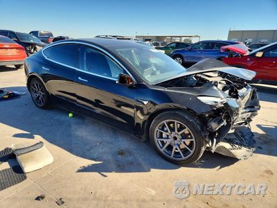 Czwarte zdjęcie samochodu z boku: 2019 TESLA MODEL 3 VIN:5YJ3E1EA7KF395501 - miniatura