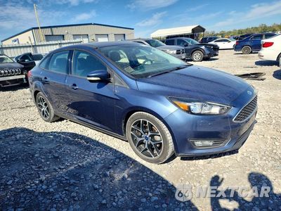 Czwarte zdjęcie samochodu z boku: 2018 FORD FOCUS SEL VIN:1FADP3H25JL259724 - miniatura