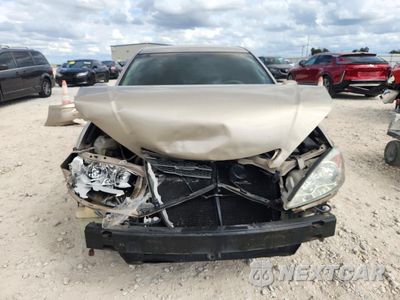 Piąte zdjęcie samochodu w środku: 2004 TOYOTA CAMRY LE VIN:4T1BE30K44U910130 - miniatura