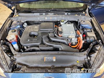 Zdjęcie 11 z 12 samochodu: 2018 FORD FUSION SE HYBRID VIN:3FA6P0LU9JR232396 - miniatura