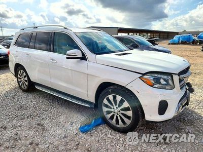 Czwarte zdjęcie samochodu z boku: 2017 MERCEDES-BENZ GLS 450 4MATIC VIN:4JGDF6EE6HA786766 - miniatura