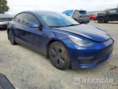 Czwarte zdjęcie samochodu z boku: 2021 TESLA MODEL 3 VIN:5YJ3E1EB4MF065620 - miniatura