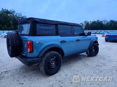 Trzecie zdjęcie samochodu z tyłu: 2022 FORD BRONCO BASE VIN:1FMDE5BHXNLB40755 - miniatura