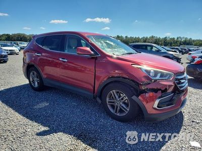 Czwarte zdjęcie samochodu z boku: 2017 HYUNDAI SANTA FE SPORT 2.4L VIN:5XYZT3LB6HG399032 - miniatura