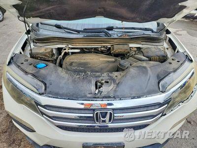 Zdjęcie 12 z 13 samochodu: 2017 HONDA PILOT VIN:5FNYF5H5XHB024608 - miniatura