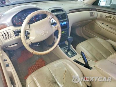 Zdjęcie 8 z 12 samochodu: 1999 TOYOTA CAMRY SOLARA SLE V6 VIN:2T1CF22P2XC129066 - miniatura