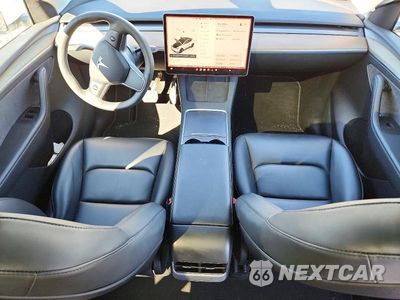 Zdjęcie 8 z 12 samochodu: 2023 TESLA MODEL Y VIN:7SAYGDEE7PA059519 - miniatura