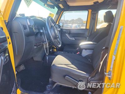 Zdjęcie 7 z 14 samochodu: 2015 JEEP WRANGLER UNLIMITED SPORT VIN:1C4BJWDG9FL711106 - miniatura
