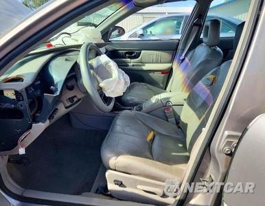 Zdjęcie 7 z 12 samochodu: 1999 BUICK REGAL GS VIN:2G4WF5215X1508132 - miniatura