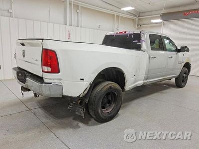 Trzecie zdjęcie samochodu z tyłu: 2015 RAM 3500 SLT VIN:3C63RRHL6FG579688 - miniatura