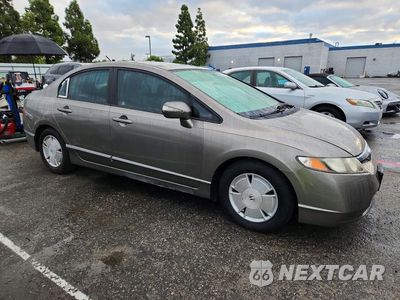 Czwarte zdjęcie samochodu z boku: 2007 HONDA CIVIC HYBRID VIN:JHMFA36207S013992 - miniatura