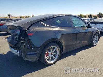 Trzecie zdjęcie samochodu z tyłu: 2023 TESLA MODEL Y VIN:7SAYGDEF1PF925419 - miniatura