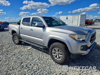 Czwarte zdjęcie samochodu z boku: 2018 TOYOTA TACOMA SR5 V6 VIN:5TFAZ5CN4JX064565 - miniatura