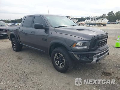 Czwarte zdjęcie samochodu z boku: 2017 RAM 1500 REBEL VIN:1C6RR7YT4HS702060 - miniatura