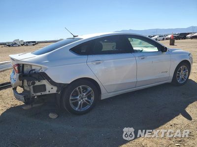 Trzecie zdjęcie samochodu z tyłu: 2016 FORD FUSION SE HYBRID VIN:3FA6P0LU1GR127344 - miniatura