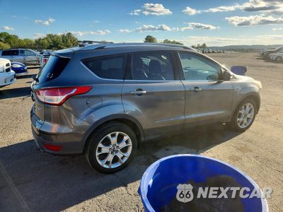 Trzecie zdjęcie samochodu z tyłu: 2014 FORD ESCAPE TITANIUM VIN:1FMCU9J98EUC72620 - miniatura