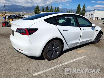Trzecie zdjęcie samochodu z tyłu: 2022 TESLA MODEL 3 VIN:5YJ3E1EA6NF342566 - miniatura