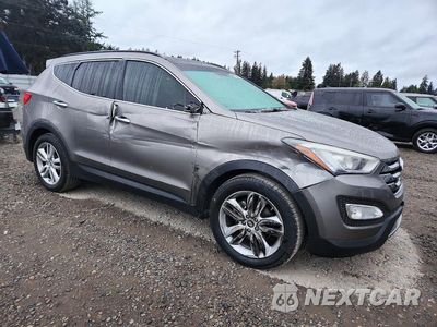 Czwarte zdjęcie samochodu z boku: 2014 HYUNDAI SANTA FE SPORT 2.0T VIN:5XYZW3LA7EG182597 - miniatura