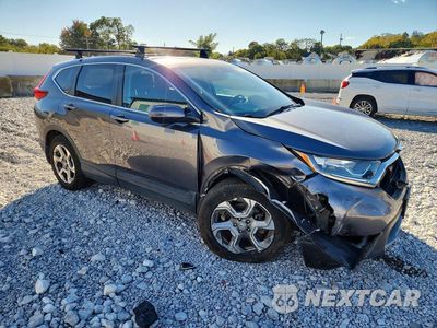 Czwarte zdjęcie samochodu z boku: 2017 HONDA CR-V EXL VIN:2HKRW2H86HH129144 - miniatura