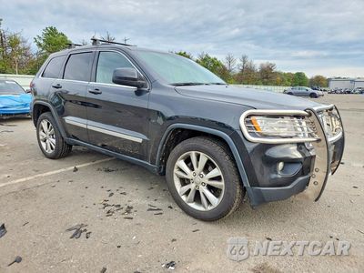 Czwarte zdjęcie samochodu z boku: 2013 JEEP GRAND CHEROKEE LAREDO VIN:1C4RJFAG6DC639734 - miniatura