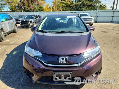 Piąte zdjęcie samochodu w środku: 2016 HONDA FIT EX VIN:3HGGK5H73GM704886 - miniatura