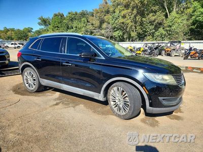 Czwarte zdjęcie samochodu z boku: 2016 LINCOLN MKX RESERVE VIN:2LMTJ6LR7GBL40763 - miniatura