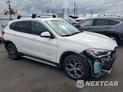 Czwarte zdjęcie samochodu z boku: 2016 BMW X1 XDRIVE28I VIN:WBXHT3C34G5E51596 - miniatura