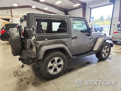 Trzecie zdjęcie samochodu z tyłu: 2016 JEEP WRANGLER SAHARA VIN:1C4AJWBG4GL203559 - miniatura